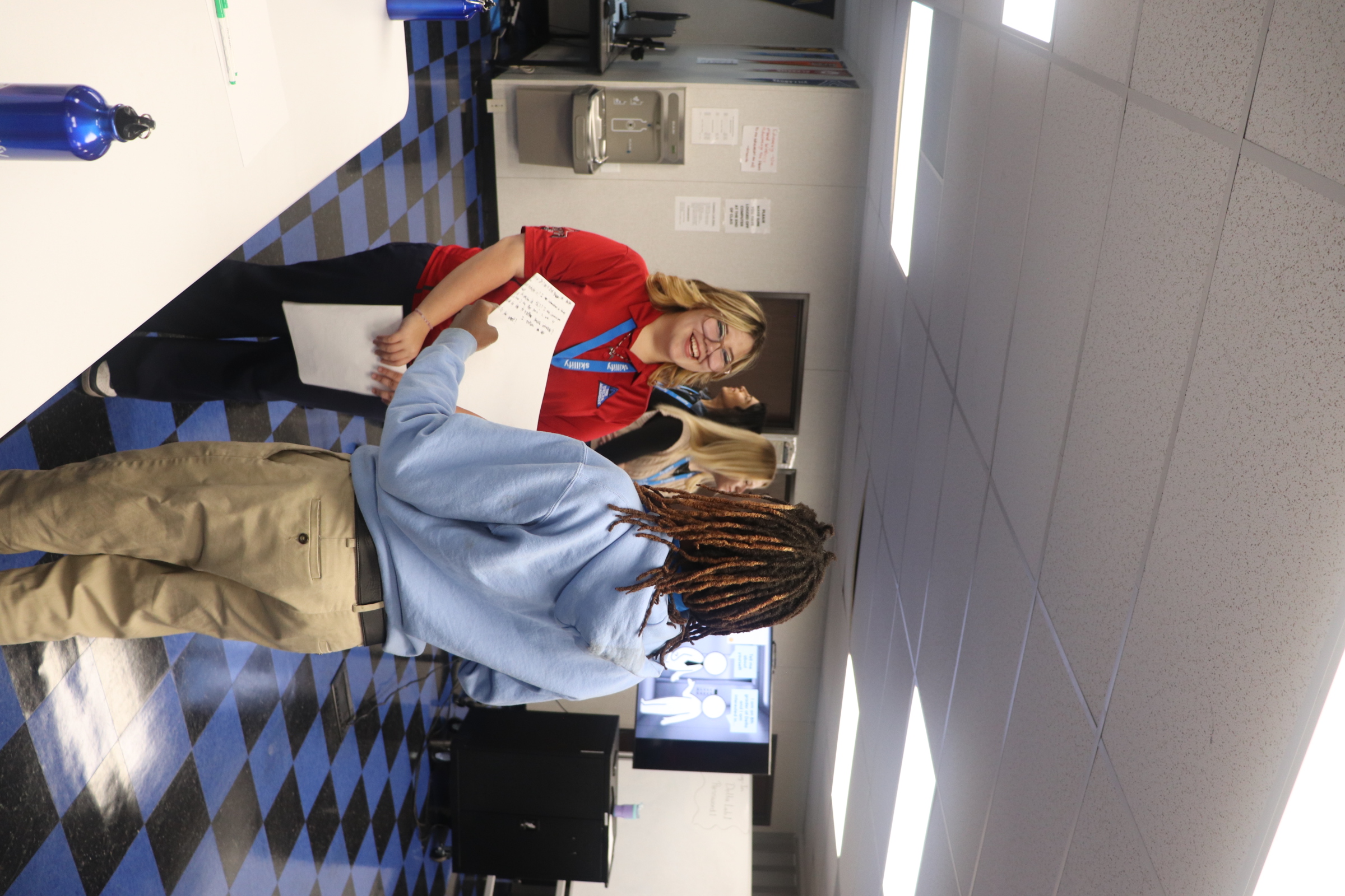 Students practicing networking at Delta Academy